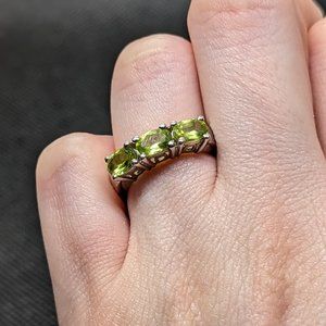 PTP platinum bonded ring in silver tone with genuine peridot size 6
